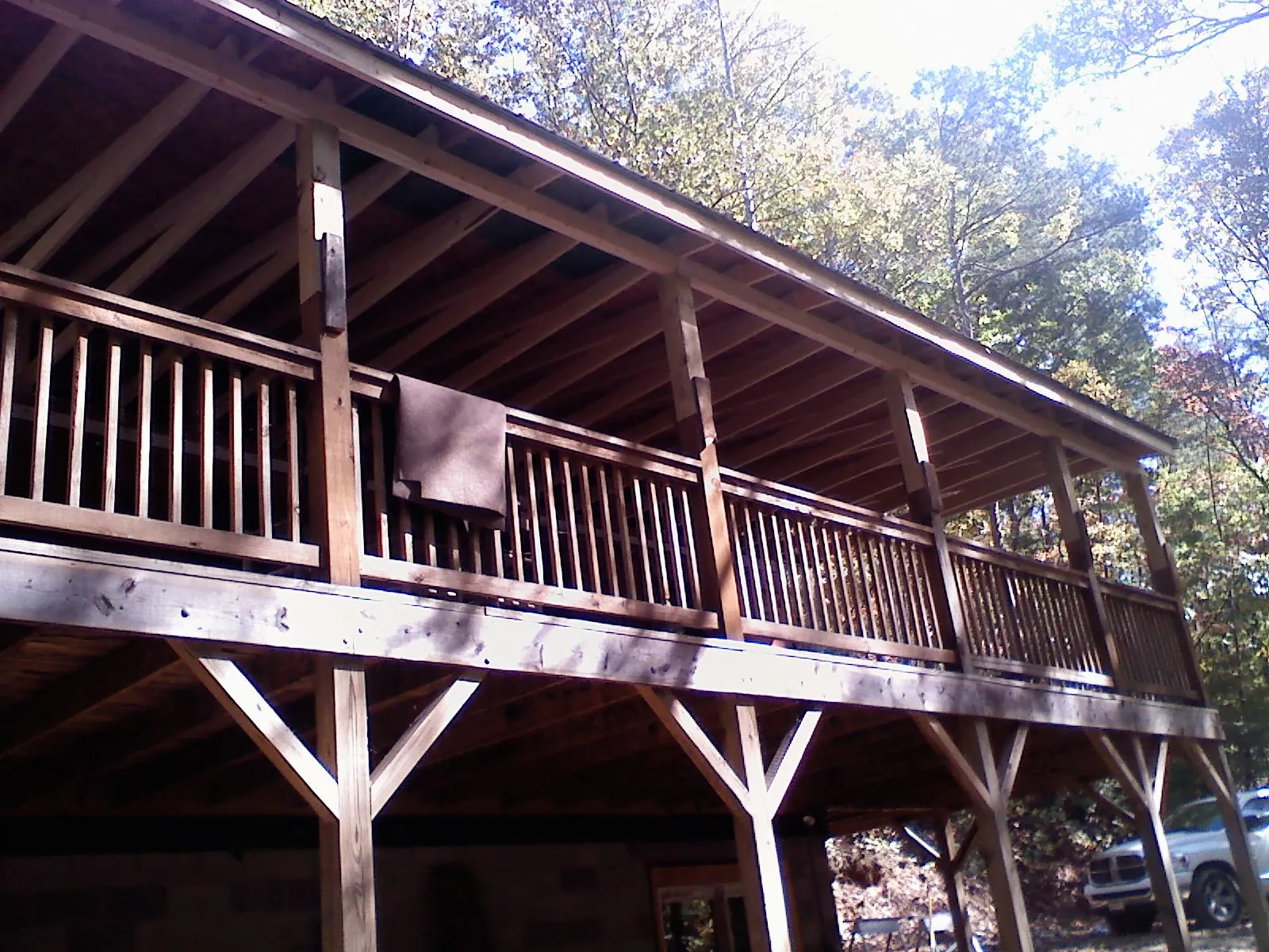 Timber framing under a new elevated porch and deck — Roof Leak Repair in Perley by Roofing Brothers